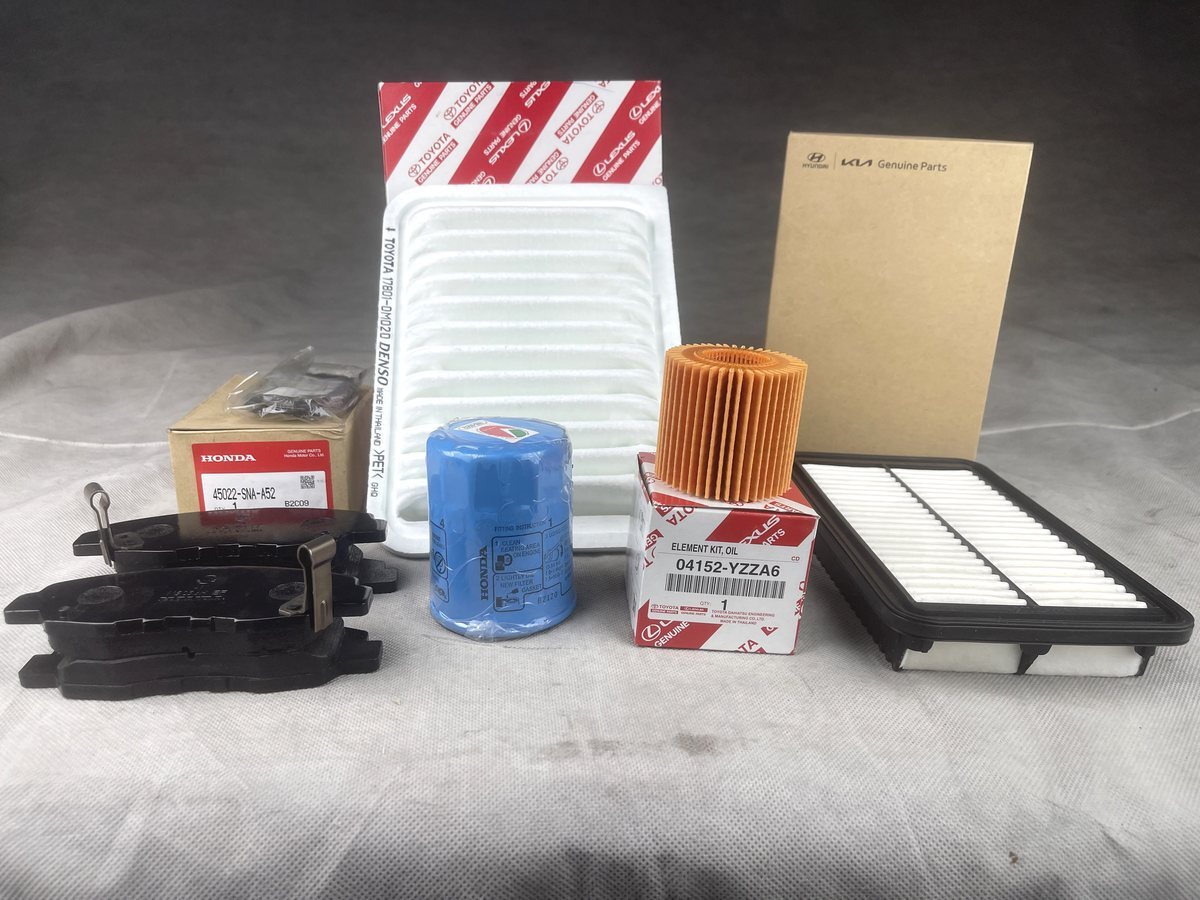 Toyota, Honda and Hyundai-Kia genuine filters and brake pads with their original boxes